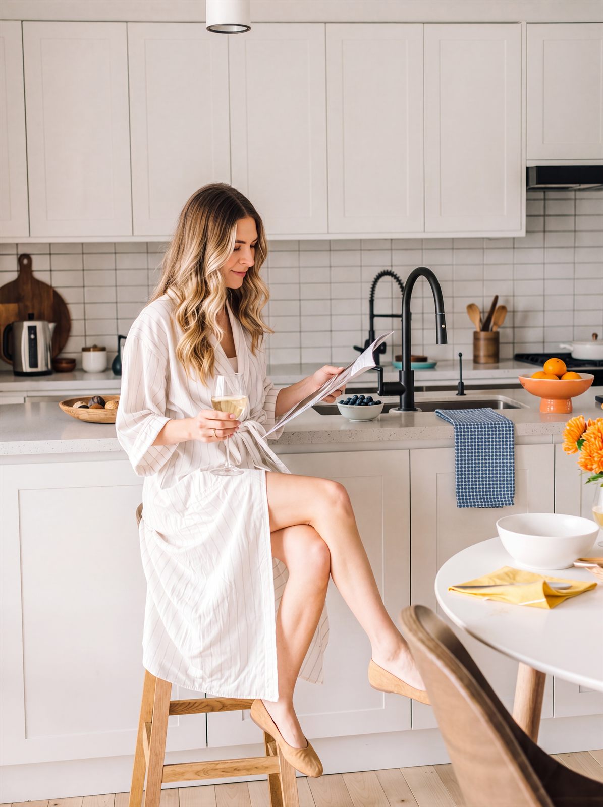 At the kitchen counter at 9pm, reading with a glass of wine instead of planning tomorrow